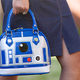 Illustration for article titled Carry Your Keys, Wallet, and Death Star Plans in This R2-D2 Handbag